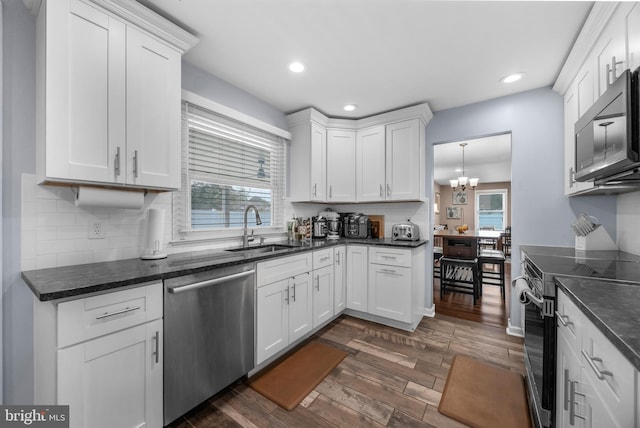 17 Concord Rd, Marlton, NJ 08053 - kitchen with appliances with stainless steel finishes, a sink, dark wood-style flooring, white cabinets, and recessed lighting