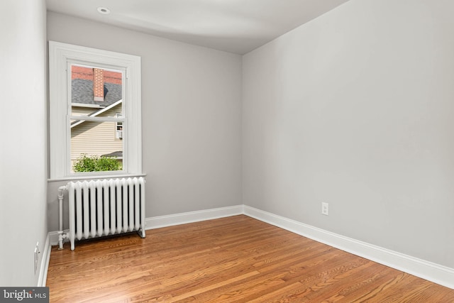 303 Conway Ave, Narberth, PA 19072 - unfurnished room with radiator, light wood-style floors, and baseboards