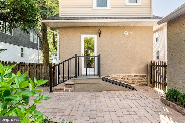 303 Conway Ave, Narberth, PA 19072 - property entrance with stucco siding and a shingled roof