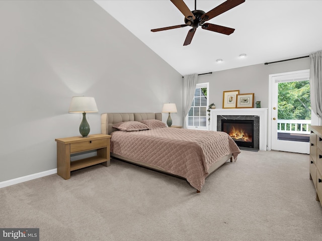 2772 Gingerview Ln, Annapolis, MD 21401 - bedroom with access to outside, carpet floors, multiple windows, a high end fireplace, and high vaulted ceiling