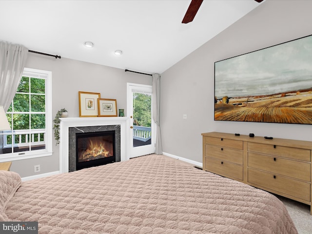 2772 Gingerview Ln, Annapolis, MD 21401 - bedroom featuring access to outside, lofted ceiling, baseboards, carpet, and a fireplace