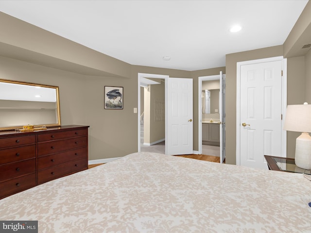 2772 Gingerview Ln, Annapolis, MD 21401 - bedroom featuring baseboards, recessed lighting, and connected bathroom