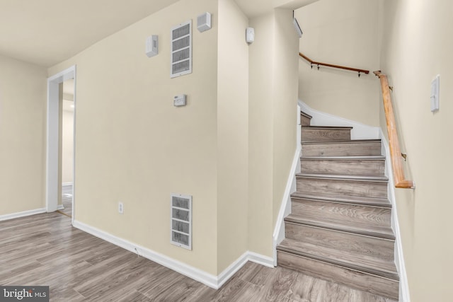 2923 Wasp Rd, Camden, NJ 08104 - stairs featuring wood finished floors and baseboards