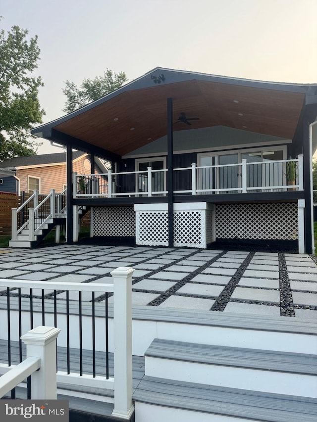 448 Carvel Beach Rd, Carvel Beach, MD 21226 - wooden terrace featuring a ceiling fan and stairs