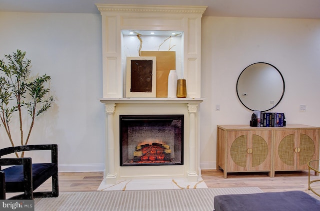 4938 Walton Ave, Philadelphia, PA 19143 - detailed view of wood finished floors and a fireplace with flush hearth