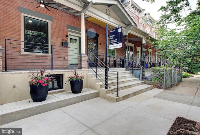 4938 Walton Ave, Philadelphia, PA 19143 - entrance to property featuring a porch and brick siding
