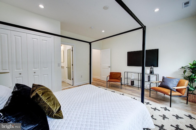 4938 Walton Ave, Philadelphia, PA 19143 - bedroom featuring wood finished floors, a closet, and recessed lighting