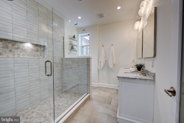 4938 Walton Ave, Philadelphia, PA 19143 - bathroom featuring vanity, a stall shower, and recessed lighting