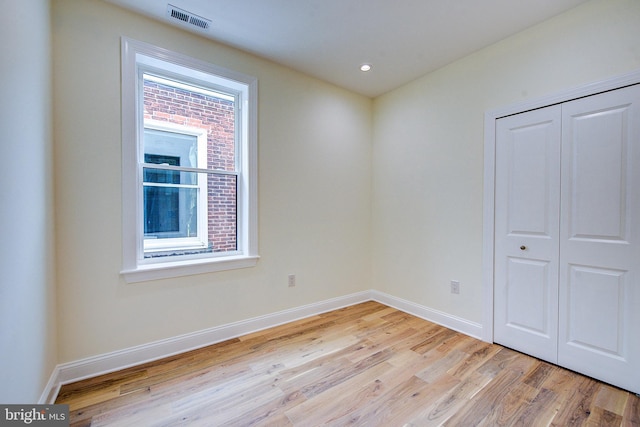 4938 Walton Ave, Philadelphia, PA 19143 - unfurnished bedroom with light wood-type flooring, a closet, and recessed lighting