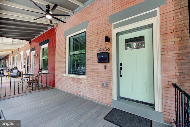 4938 Walton Ave, Philadelphia, PA 19143 - doorway to property with brick siding and covered porch
