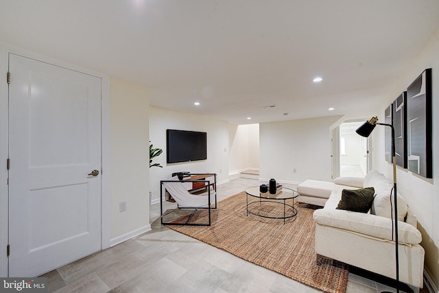 4938 Walton Ave, Philadelphia, PA 19143 - living area with light wood-style flooring and recessed lighting