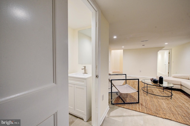 4938 Walton Ave, Philadelphia, PA 19143 - hall with recessed lighting and a sink