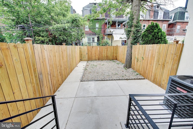 4938 Walton Ave, Philadelphia, PA 19143 - fenced backyard with a patio area