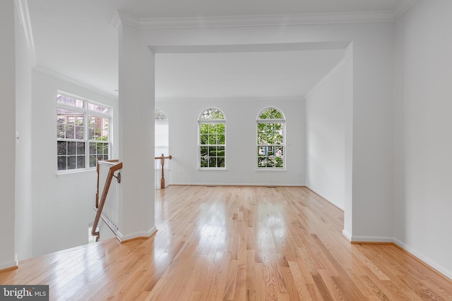5454 Patuxent Knoll Pl, Alexandria, VA 22312 - empty room featuring plenty of natural light, wood finished floors, ornamental molding, and baseboards