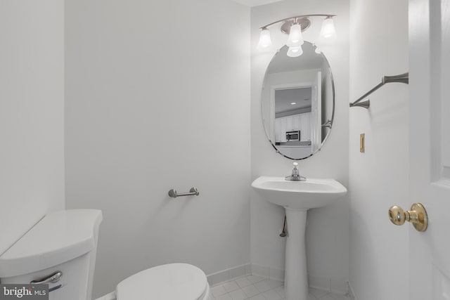 5454 Patuxent Knoll Pl, Alexandria, VA 22312 - bathroom with toilet, tile patterned floors, and baseboards