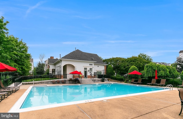 5454 Patuxent Knoll Pl, Alexandria, VA 22312 - community pool featuring a patio