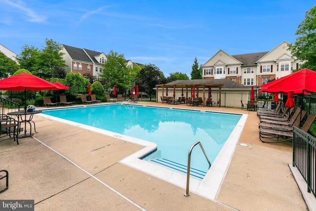 5454 Patuxent Knoll Pl, Alexandria, VA 22312 - community pool featuring a patio