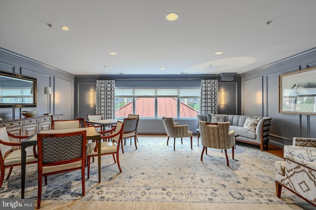 12251 Roundwood Rd Unit 301, Lutherville Timonium, MD 21093 - dining area with crown molding, a decorative wall, wood finished floors, and recessed lighting