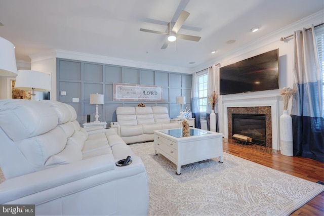 2703 Brownlee Ct, Lanham, MD 20706 - living room featuring ornamental molding, ceiling fan, wood finished floors, a premium fireplace, and recessed lighting