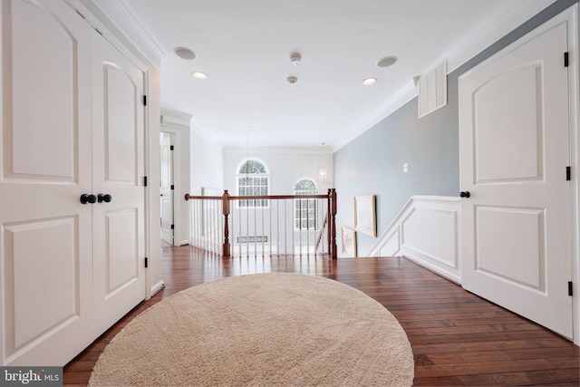 2703 Brownlee Ct, Lanham, MD 20706 - hallway featuring ornamental molding, an upstairs landing, dark wood-style flooring, and recessed lighting