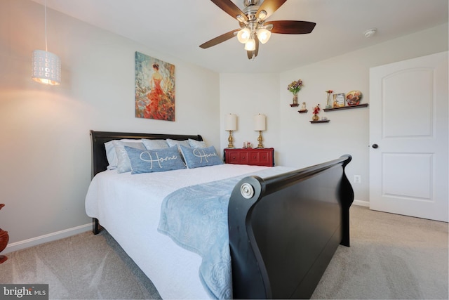 2703 Brownlee Ct, Lanham, MD 20706 - bedroom with light carpet, baseboards, and a ceiling fan