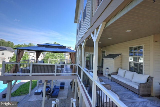 2703 Brownlee Ct, Lanham, MD 20706 - deck with a gazebo, an outdoor living space, and a patio