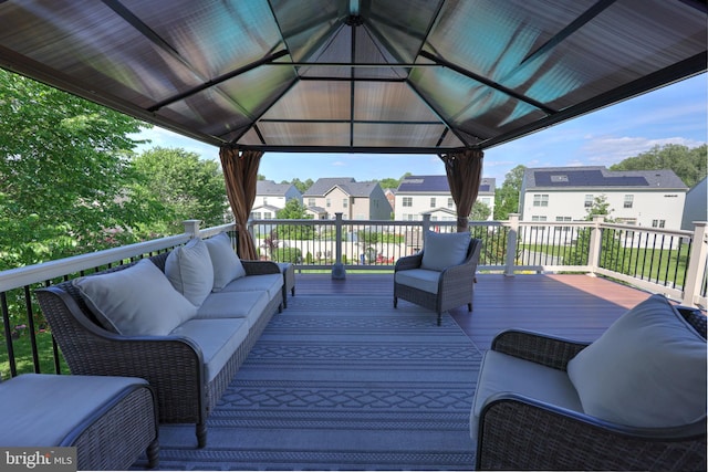 2703 Brownlee Ct, Lanham, MD 20706 - wooden terrace with a gazebo, outdoor lounge area, and a residential view