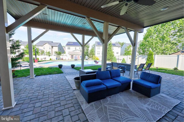 2703 Brownlee Ct, Lanham, MD 20706 - view of patio featuring a ceiling fan, a residential view, and outdoor lounge area
