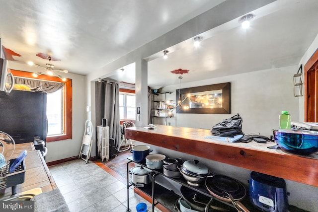 6720 Dorel St, Philadelphia, PA 19142 - kitchen with light tile patterned floors and baseboards