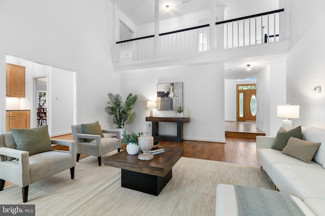 4920 Sunset Ln, Annandale, VA 22003 - living room with a towering ceiling and wood finished floors