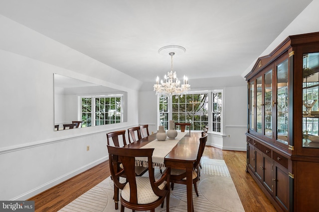 4920 Sunset Ln, Annandale, VA 22003 - dining space with a chandelier and wood finished floors