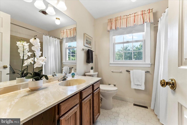 1771 Hunters Cir, West Chester, PA 19380 - full bathroom featuring toilet, vanity, tile patterned floors, baseboards, and a shower with shower curtain