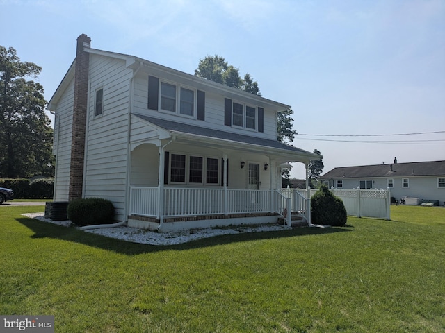 3339 Bruun Ave, Vineland, NJ 08360 - view of front of property featuring a chimney, a porch, and a front yard