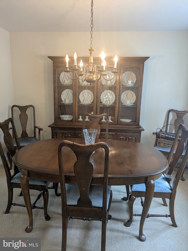 3339 Bruun Ave, Vineland, NJ 08360 - dining room featuring carpet floors and a chandelier
