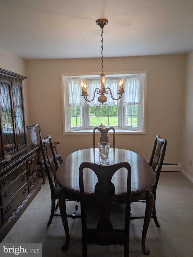 3339 Bruun Ave, Vineland, NJ 08360 - dining space with carpet floors, healthy amount of natural light, a baseboard radiator, and a chandelier