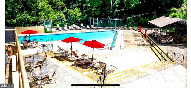 3600 Conshohocken Ave Unit 705, Philadelphia, PA 19131 - community pool with view of scattered trees and a patio area