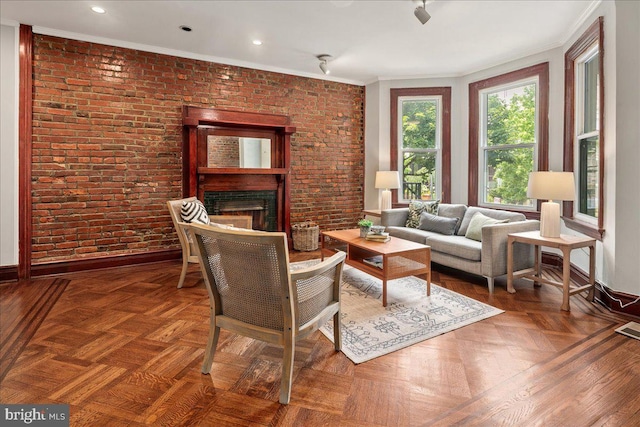 1360 Perry Pl NW, Washington, DC 20010 - living area with a fireplace, baseboards, crown molding, brick wall, and recessed lighting