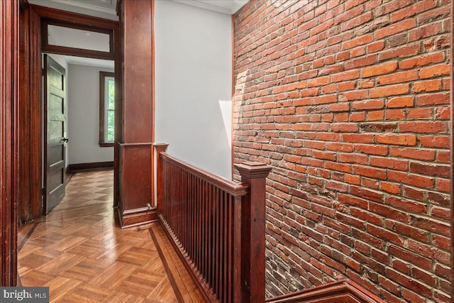 1360 Perry Pl NW, Washington, DC 20010 - corridor with a wainscoted wall, brick wall, an upstairs landing, and ornamental molding