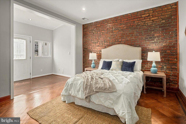 1360 Perry Pl NW, Washington, DC 20010 - bedroom with baseboards, brick wall, crown molding, wood finished floors, and recessed lighting