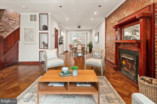 1360 Perry Pl NW, Washington, DC 20010 - living area with crown molding, baseboards, a fireplace, stairway, and recessed lighting