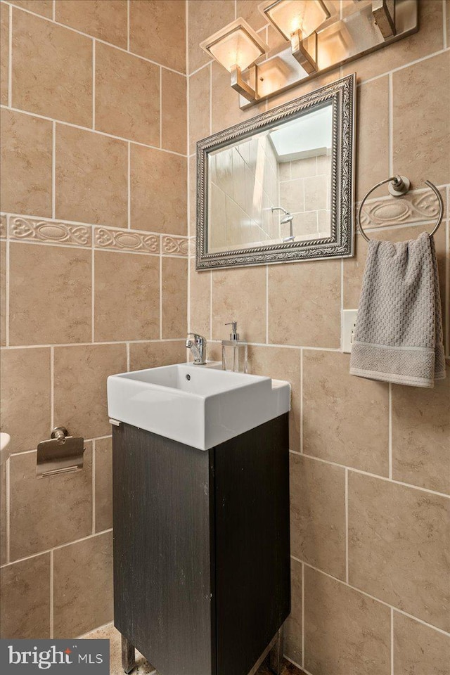 1360 Perry Pl NW, Washington, DC 20010 - bathroom featuring tile walls and vanity