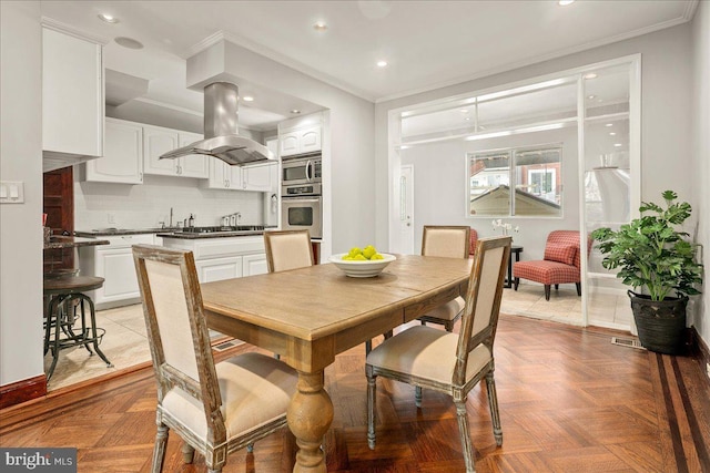 1360 Perry Pl NW, Washington, DC 20010 - dining room with ornamental molding, recessed lighting, and baseboards