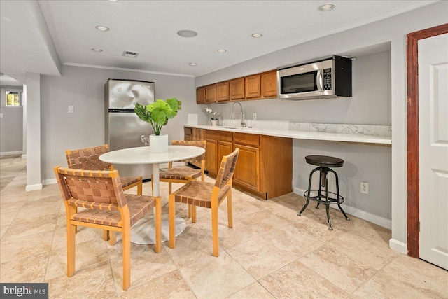1360 Perry Pl NW, Washington, DC 20010 - dining area with ornamental molding, recessed lighting, and baseboards