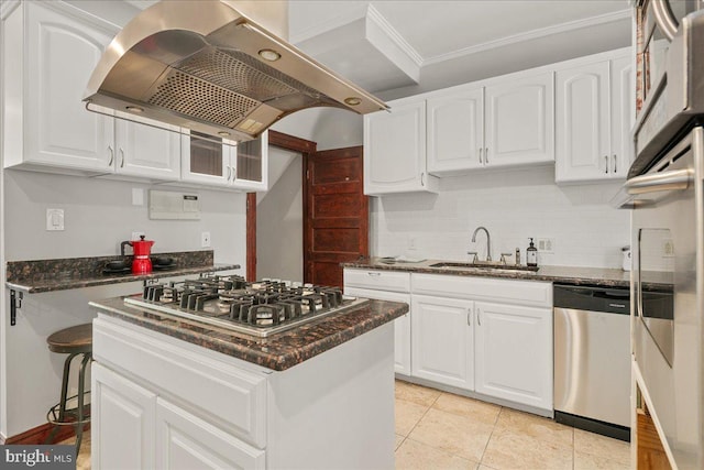 1360 Perry Pl NW, Washington, DC 20010 - kitchen with appliances with stainless steel finishes, island range hood, crown molding, a sink, and dark stone countertops