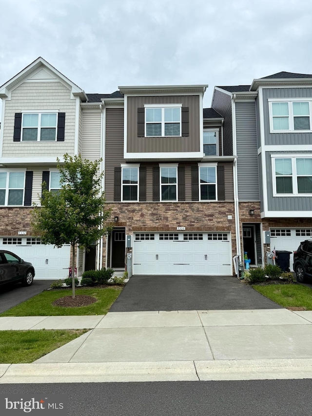 7330 Isabella Rd, Laurel, MD 20723 - view of property with driveway and an attached garage