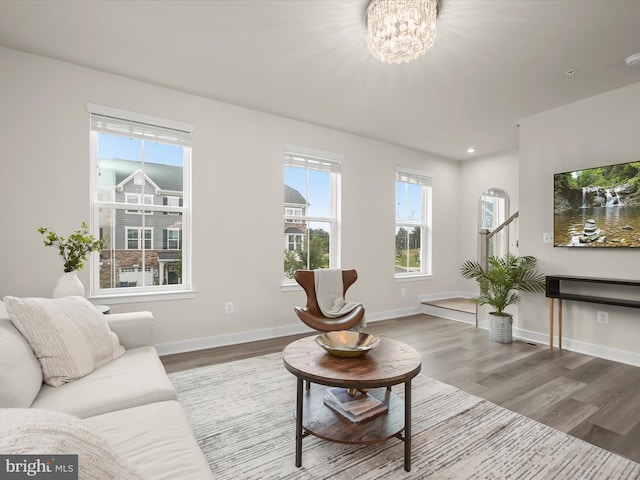 7330 Isabella Rd, Laurel, MD 20723 - living area with wood finished floors, healthy amount of natural light, a chandelier, and recessed lighting