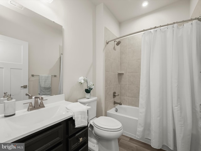 7330 Isabella Rd, Laurel, MD 20723 - full bathroom featuring wood finished floors, vanity, shower / bath combo, and recessed lighting
