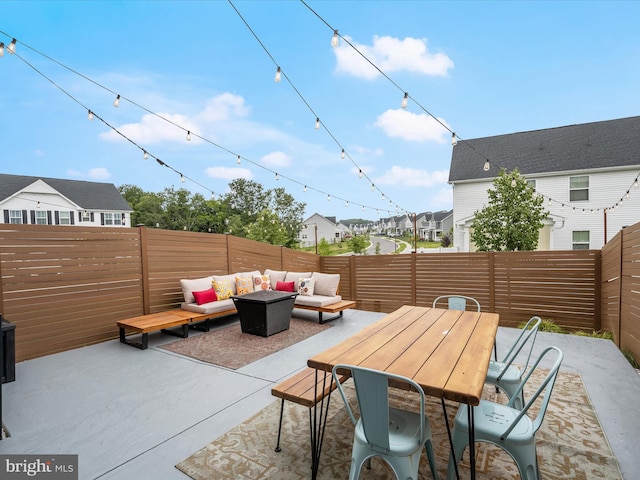 7330 Isabella Rd, Laurel, MD 20723 - fenced backyard featuring an outdoor hangout area, a patio area, and a residential view