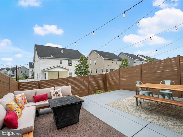 7330 Isabella Rd, Laurel, MD 20723 - fenced backyard featuring an outdoor hangout area, a patio area, a residential view, and outdoor dining area