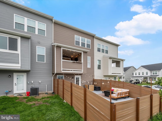 7330 Isabella Rd, Laurel, MD 20723 - back of house with an outdoor living space and a residential view